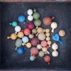 Plastic Pop-it beads, 1950s onwards