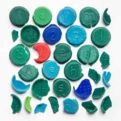 Broken Smartie lids found on  beaches, 14-40+ years old