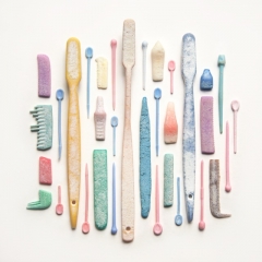 Vintage toothbrushes, hair curler pins & combs