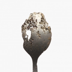 Corroded teaspoon