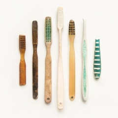 Toothbrushes: bone, vintage plastic and modern combination plastics
